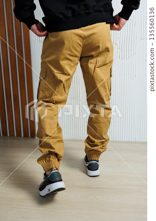 Men's green casual sweatpants with pockets. Lightweight summer pants for men. Men's green casual sweatpants with pockets. Lightweight summer pants for men. 135560136