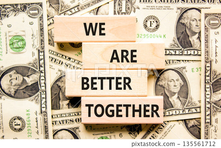 We are better together symbol. Concept words phrase We are better together on beautiful blocks. Dollar bills. Beautiful dollar bills background. Business We are better together concept. Copy space 135561712