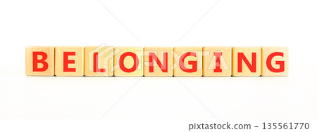 Belonging symbol. Concept words Belonging on beautiful wooden blocks. Beautiful white background. Business support belonging concept. Copy space. Belonging symbol. Concept words Belonging on beautiful wooden blocks. Beautiful white background. Business support belonging concept. Copy space. 135561770