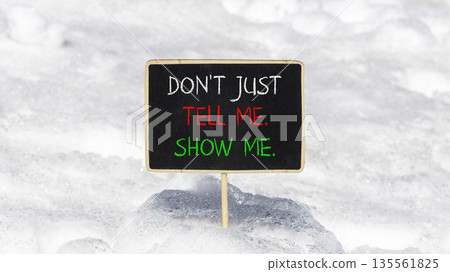 Tell or show symbol. Concept words Do not just tell me, show me on beautiful blackboard. Beautiful white snow background. Business tell or show concept. Copy space. Tell or show symbol. Concept words Do not just tell me, show me on beautiful blackboard. Beautiful white snow background. Business tell or show concept. Copy space. 135561825