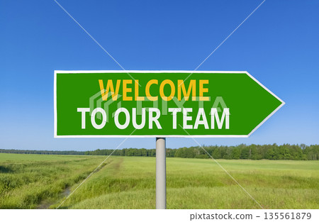Support, help welcome to our team symbol. Concept words Welcome to our team on beautiful green road sign. Beautiful blue sky green field background. Business welcome to our team concept. Copy space. 135561879