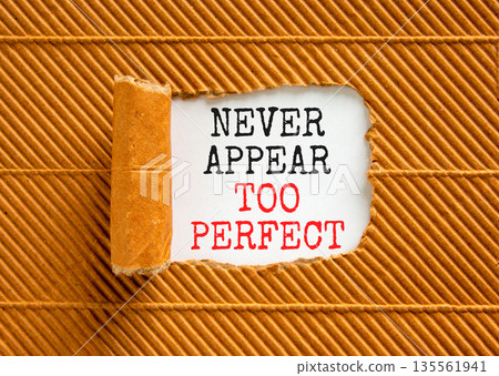 Never appear too perfect symbol. Concept words Never appear too perfect on beautiful white paper. Beautiful brown background. Business never appear too perfect concept. Copy space. Never appear too perfect symbol. Concept words Never appear too perfect on beautiful white paper. Beautiful brown background. Business never appear too perfect concept. Copy space. 135561941