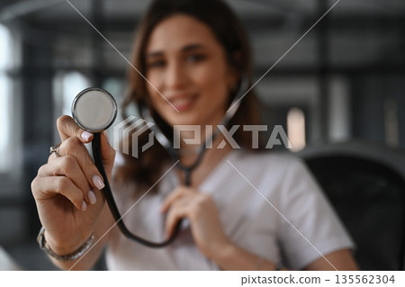 Professional stethoscope. Woman doctor is in the office 135562304