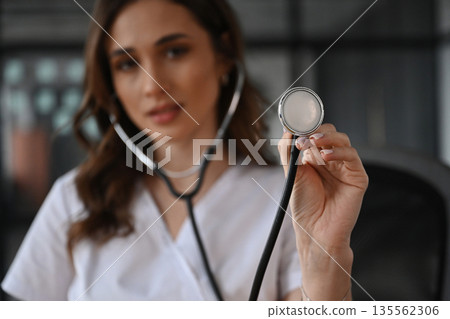Professional stethoscope. Woman doctor is in the office Professional stethoscope. Woman doctor is in the office 135562306
