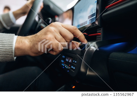 Screen with map, navigation. Man is sitting in car, detailed view Screen with map, navigation. Man is sitting in car, detailed view 135562967
