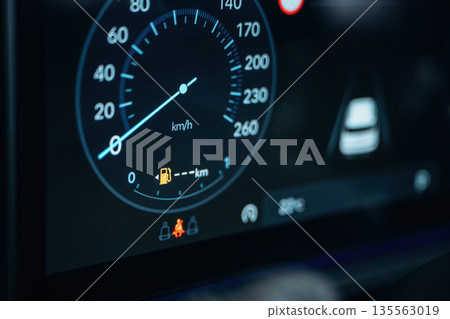 Detailed close up view of speedometer, front panel Detailed close up view of speedometer, front panel 135563019