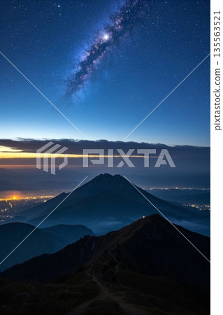 Panoramic view of the starry sky and city nightscape from the mountaintop 135563521