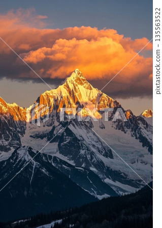 Magnificent sunset view of snow-capped mountains 135563522