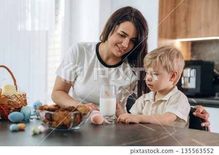 Mother and son are preparing bakery at home 135563552