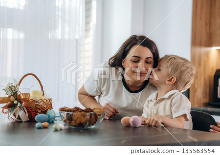 Mother and son are preparing bakery at home Mother and son are preparing bakery at home 135563554