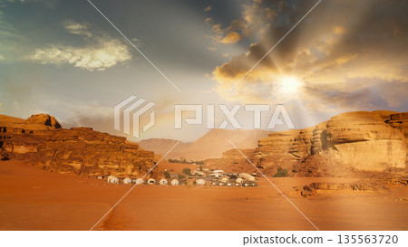 Wadi Rum desert, Jordan, The Valley of the Moon. Desert landscape with tents at sunset Wadi Rum desert, Jordan, The Valley of the Moon. Desert landscape with tents at sunset 135563720