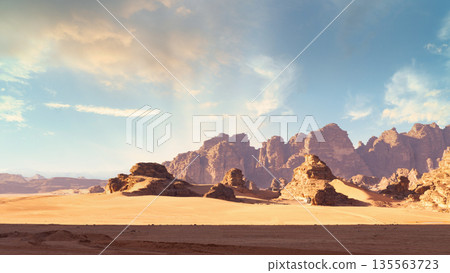 Desert landscape with rocky formations and clear sky at sunset in open area. Wadi Rum desert, Jordan 135563723