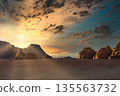 Sunset over rocky landscape setting with clouds on sky. Wadi Rum desert, Jordan, The Valley of Moon 135563732