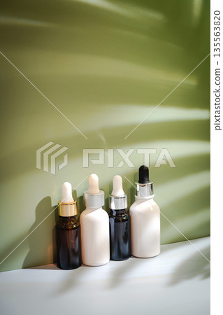 Bottle with oil or serum Bottle with oil or serum 135563820