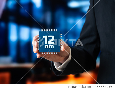 Production of computer microchips using the 12 nm process technology. Semiconductor manufacturing concept, industrial scale and cost efficiency. Mature chip technology supporting electronics 135564956