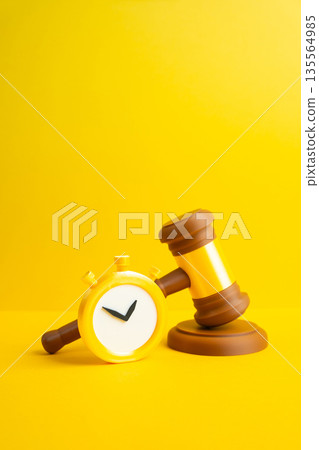 A judge's gavel and stopwatch on a yellow background. Court decisions and deadlines for execution of verdicts. Legal timing concept, enforcement pressure and responsibility for compliance 135564985