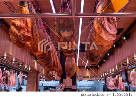 Traditional hamon shop in Central Market of Barcelona, traditional food Traditional hamon shop in Central Market of Barcelona, traditional food 135565512