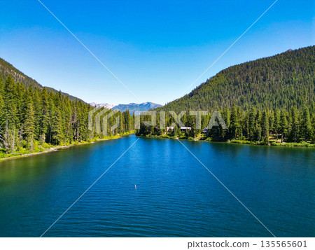 Cooper lake with mountain landscape. Landscape of mountain and forest of Cooper lake. Nature landscape. Cooper Lake in Washington. Scenic nature of popular hiking Cooper lake. Blue water Cooper lake with mountain landscape. Landscape of mountain and forest of Cooper lake. Nature landscape. Cooper Lake in Washington. Scenic nature of popular hiking Cooper lake. Blue water 135565601