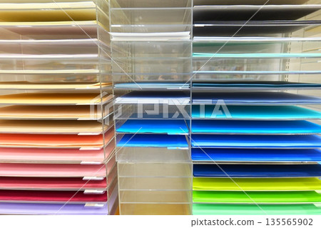 Stacked pretty colored paper files Stacked pretty colored paper files 135565902