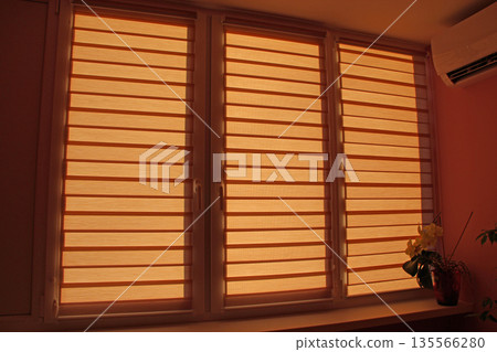Modern jalousie day and night horizontal in room with conditioner Modern jalousie day and night horizontal in room with conditioner 135566280