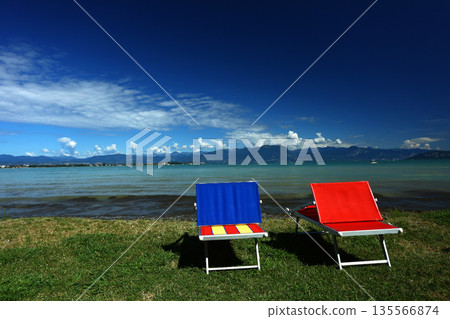 Sirmione town by Lake Garda under summer sky Sirmione town by Lake Garda under summer sky 135566874