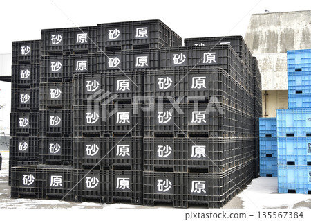 Photographing the scenery of stacked containers at Sunahara Fishing Port in Morimachi, Hokkaido in winter Photographing the scenery of stacked containers at Sunahara Fishing Port in Morimachi, Hokkaido in winter 135567384