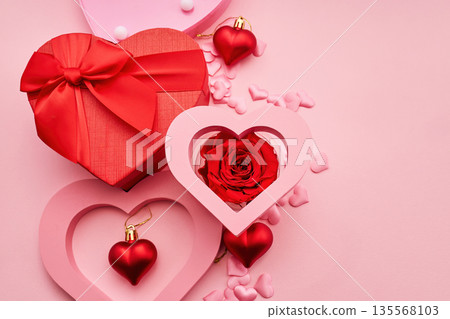 Romantic valentine's day composition with heart shaped gift box and rose 135568103