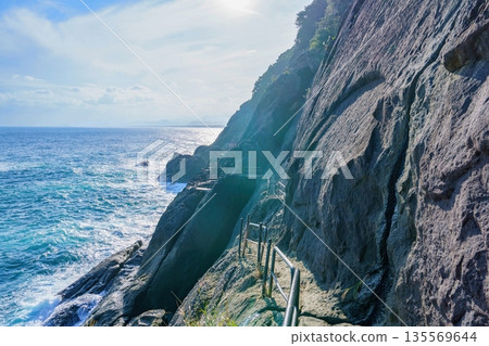 The spectacular view of the World Heritage Site Onigajo, the coastal promenade along the cliffs and the blue sea The spectacular view of the World Heritage Site Onigajo, the coastal promenade along the cliffs and the blue sea 135569644