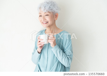 senior woman with mug senior woman with mug 135570660