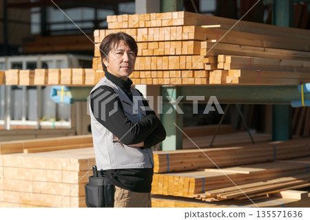 Man working at a lumber mill 135571636