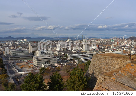 The Seto Ohashi Bridge and the Marugame cityscape as seen from the Marugame Castle tower (Marugame City, Kagawa Prefecture) The Seto Ohashi Bridge and the Marugame cityscape as seen from the Marugame Castle tower (Marugame City, Kagawa Prefecture) 135571660