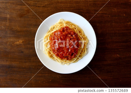 Homemade spaghetti with meat sauce, seen from above 135572689