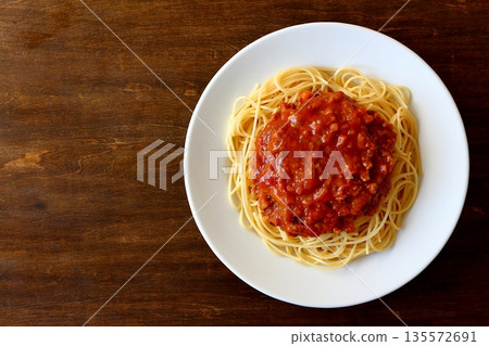 Homemade spaghetti with meat sauce, seen from above 135572691