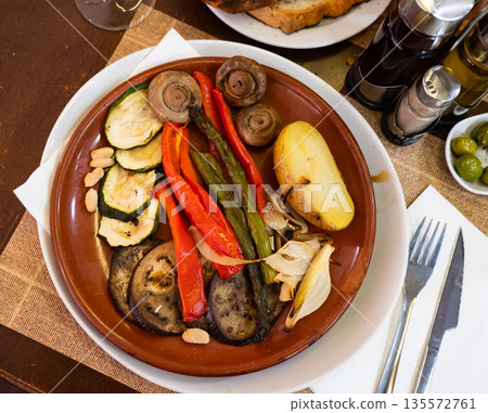 Grilled vegetables served with mushrooms Grilled vegetables served with mushrooms 135572761