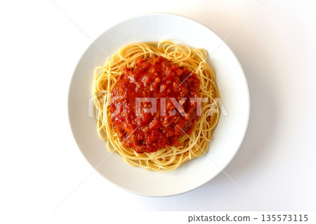 Homemade spaghetti with meat sauce on a white background, viewed from directly above 135573115