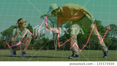 Celebrating mature golfers wearing caps fist-bumping on putting green, with putter and flagstick Celebrating mature golfers wearing caps fist-bumping on putting green, with putter and flagstick 135573939
