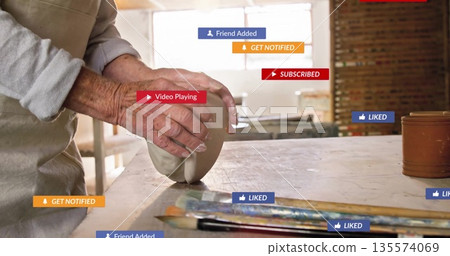 Shaping female artisan molding clay in pottery workshop with brushes, tools and notification badges Shaping female artisan molding clay in pottery workshop with brushes, tools and notification badges 135574069