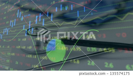 Resting stethoscope on pad displaying healthcare finance data at desk, with market graphs overlay 135574175