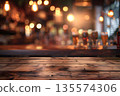 wooden table with blurred bar backdrop 135574306