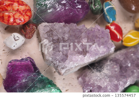 Different types of colorful crystals and stones on display Different types of colorful crystals and stones on display 135574457