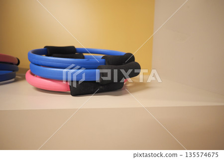 Fitness tools on display for workout session at gym studio Fitness tools on display for workout session at gym studio 135574675