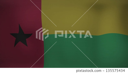 Waving fabric flag of Guinea-Bissau fluttering on fabric backdrop, showing gentle folds and shading Waving fabric flag of Guinea-Bissau fluttering on fabric backdrop, showing gentle folds and shading 135575434
