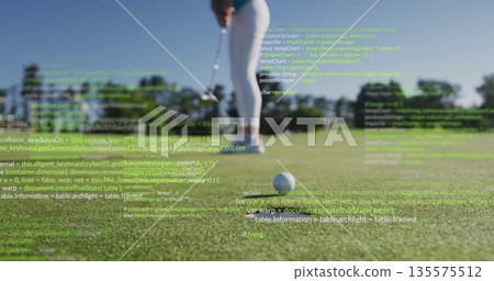 Positioning female golfer lining up putt on golf green, with golf putter, golf ball, code overlay 135575512