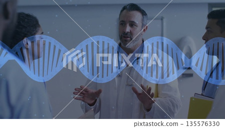 Gesturing doctor wearing coat, stethoscope discussing DNA study in corridor with graphic overlay 135576330