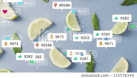 Displaying lemon-lime wedges and green leaves on blue surface, with floating social media icons Displaying lemon-lime wedges and green leaves on blue surface, with floating social media icons 135576349