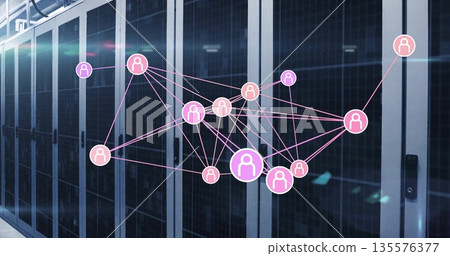 Spanning holographic network of user icons and lines across server room, with server rack cabinets 135576377