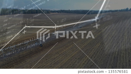 Displaying center pivot irrigation watering farmland with translucent code line graph overlays Displaying center pivot irrigation watering farmland with translucent code line graph overlays 135576581