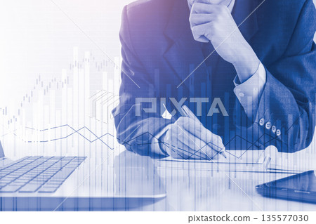 Stock market or forex trading graph and candlestick chart suitable for financial investment concept. Economy trends background for business idea and all art work design. Abstract finance background. Stock market or forex trading graph and candlestick chart suitable for financial investment concept. Economy trends background for business idea and all art work design. Abstract finance background. 135577030
