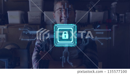 Standing man wearing plaid shirt crossing arms in workshop, glowing lock overlay with circuit lines Standing man wearing plaid shirt crossing arms in workshop, glowing lock overlay with circuit lines 135577100