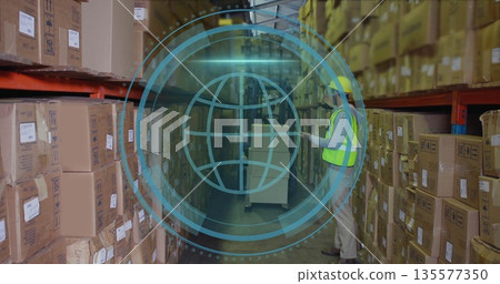 Standing warehouse worker holding tablet in warehouse aisle, with pallet jack and metal shelving Standing warehouse worker holding tablet in warehouse aisle, with pallet jack and metal shelving 135577350